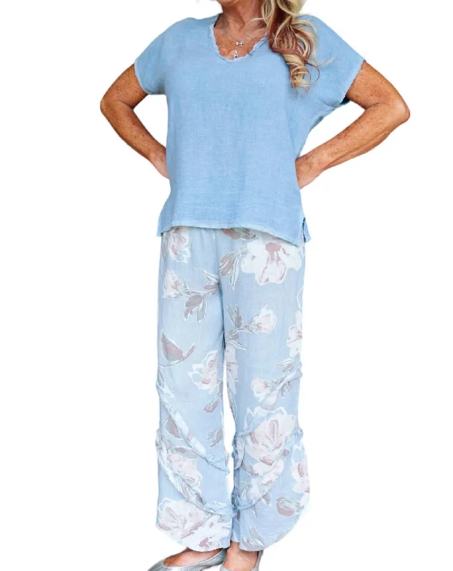 Take Action Floral Linen Pants With Ruffle Detailed Leg In Dusty Blue