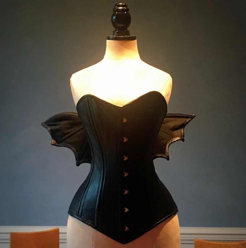 Best Seller Black real leather corset with bat wings designed by Porcelain Panic, all steel boned Best Seller Black real leather corset with bat wings designed by Porcelain Panic, all steel boned