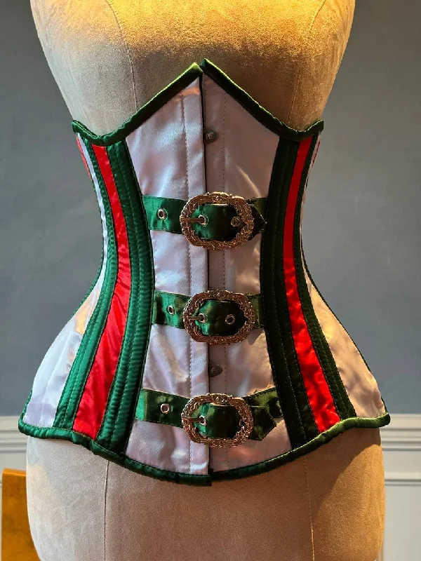 While Supplies Last Underbust red and green satin in Santa style with steampunk closure hooks in the front. Corset is made personally according to your measurements. While Supplies Last Underbust red and green satin in Santa style with steampunk closure hooks in the front. Corset is made personally according to your measurements.